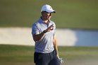McIlroy and Young share Masters lead after third round