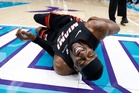 Bam Adebayo injured after LaMelo Ball trips him