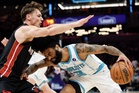 LaMelo, Bridges power Hornets over Heat in play-in