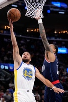 Curry, Horford lead Warriors past Clippers to stay alive