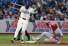 Rookie hits 8th homer as Reds top Rays