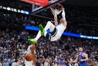 Timberwolves stun Nuggets to even series at 1-all