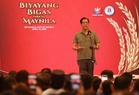 Marcos vows better jobs, worker protection on Labor Day