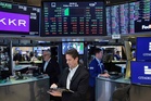 Apple leads Wall Street to more records as oil prices pull back