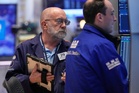 Oil prices sink and stocks leap worldwide on hopes for a reopening of the Strait of Hormuz