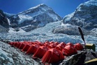 Mount Everest season opens late, with climbers undeterred by huge ice block and high travel costs