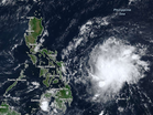 Tropical Storm Caloy weakens into tropical depression while moving over Philippine Sea