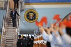 Trump arrives in China to meet with Xi in Beijing