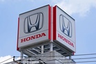 Honda posts first annual loss on $9 billion EV writedown costs