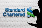 StanChart targets higher return, to reduce more than 7,000 roles by 2030