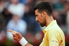 Djokovic trying to hold back time at French Open