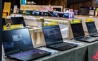 Sales personnel nabbed for stealing laptop
