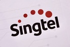 SG telecom Singtel reports higher annual profit
