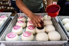 Revelers pack a Hong Kong island for a bun festival, a century-old tradition