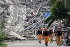 Remulla to seek DOJ hold departure order vs owner, contractor of collapsed Angeles City building