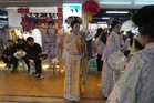 Dressing visitors in ancient China's imperial splendor is booming in Beijing