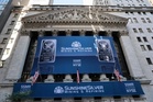 The Dow leaps to a record as oil prices ease and US stocks outside of AI rally