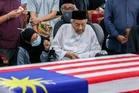 Dr Siti Hasmah laid to rest
