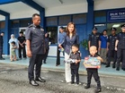 Four-year-old cancer patient trades hospital routine for dream police ride