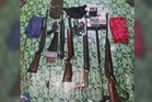 Wanita ditahan bersama lima senjata api termasuk M-16