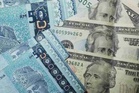 Ringgit dibuka tinggi berbanding mata wang utama, rendah berbanding dolar AS