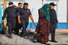Ibu dan anak lelaki didakwa simpan lembu curi