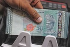 Ringgit ditutup rendah susulan sentimen menjelang pengumuman data penting AS