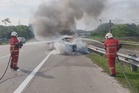 MPV terbakar di Lebuhraya Damansara - Puchong
