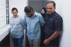 Terkait ah long, suami isteri didakwa khianat simbah cat merah, baling bom molotov