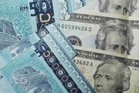 Ringgit ditutup rendah berbanding dolar AS