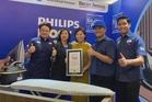Seterika 49 baju sekolah dalam sejam, Philips cipta rekod MBOR