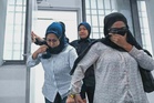 Dua wanita didakwa tiga pertuduhan menipu