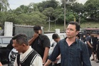 Lelaki warga Singapura didakwa halang tugas polis, miliki senjata berbahaya