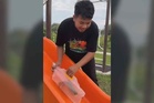'Saya masih waras' - Pemuda bawa arowana main gelongsor di taman