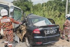 Empat maut kereta bertembung lori
