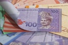Ringgit dibuka tinggi berbanding dolar AS menjelang mesyuarat bank pusat utama