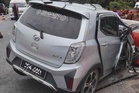 Wanita maut, Axia bertembung lori muatan sabut kelapa