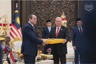 Agong kurnia Darjah Utama Seri Mahkota Negara kepada Raja Jordan