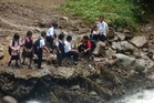 Murid SK Wassai jalan kaki ke sekolah selepas jambatan dihanyutkan arus