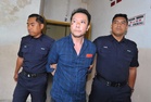 Lelaki Singapura tular provokasi anggota trafik didakwa di mahkamah