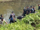Tong bersimen berisi rangka manusia ditemui di tepi empangan