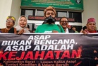 Protes merebak di Indonesia bantah isu kebakaran hutan, jerebu