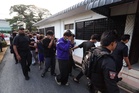 Dua beradik antara 14 lelaki didakwa membunuh