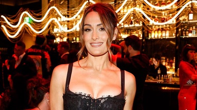 Nikki Bella throws out the bat signal again and says she's still willing to risk it all for Batman
