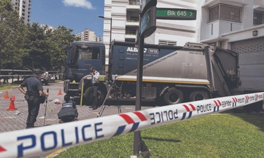 Amputee, 69, dies after being struck by garbage truck in Bukit Panjang, wheelchair dragged under vehicle