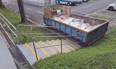 Skip bin blocking stairs at Hougang HDB forces residents to detour, contractor slammed as ‘selfish’