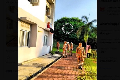 Two girls try to commit “suicide” by jumping from the first floor of a building