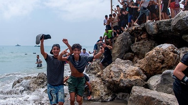 At least 50,000 migrants cross into Spanish territory of Ceuta from Morocco in a single day