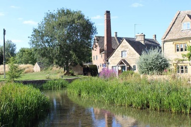 This charming village in the Cotswolds served as the backdrop for Downton Abbey