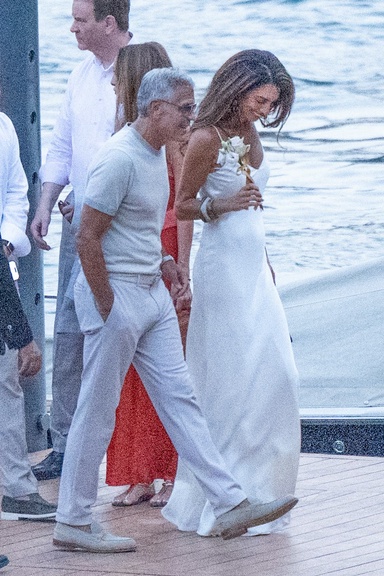 George and Amal Clooney Match in Summer Whites During Their Latest Lake Como Outing